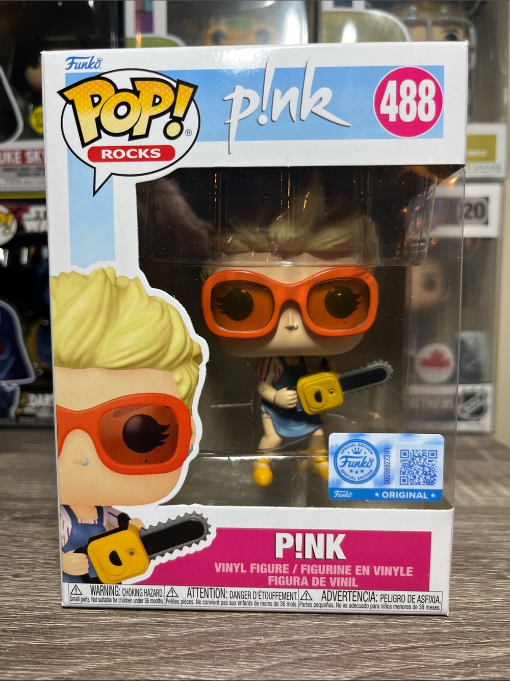 Funko Pop! Rocks P!nk Vinyl Figure with Orange Sunglasses and Yellow Chainsaw